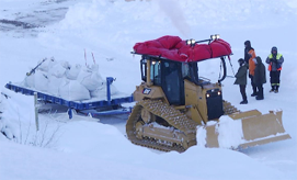 cat_d6n_with_lehman_sledge_during_field_trials_in_sweden__february_2012