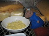mary_tucks_into_a_bowl_of_cheese_-_by_jill_bowring_167x125
